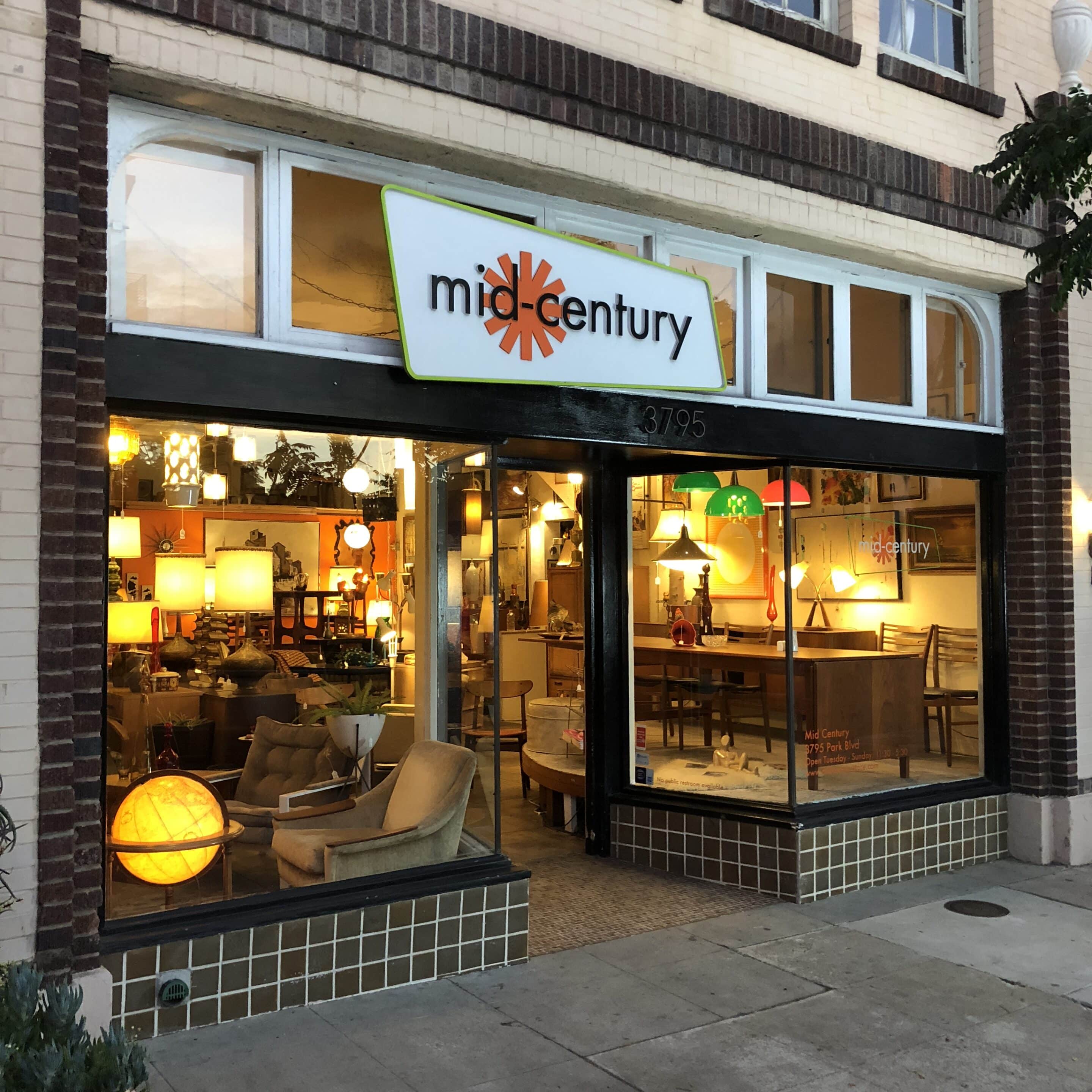 The front of Mid Century Store at night